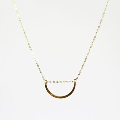 Betsy & Iya’s Gold Petal Necklace: Delicate & Stunning