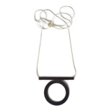 Betsy & Iya’s Black Hole Necklace: A Must-Have Statement Piece